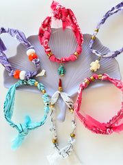 CAVIGLIERE/BRACCIALI BANDANA